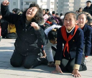 north korean communist party leader death kim jong il mother grandma kids on the floor 300x254 north korean communist party leader death kim jong il mother grandma kids on the floor
