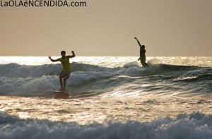two longboards surfing waves ocean sunrise two longboards surfing waves ocean sunrise 300x197 two longboards surfing waves ocean sunrise