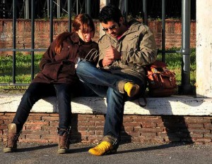 sitting couple reading cell phone stylish fashionable man woman yellow shoes boots jacket glasses sitting couple reading cell phone stylish fashionable man woman yellow shoes boots jacket glasses 300x233 sitting couple reading cell phone stylish fashionable man woman yellow shoes boots jacket glasses